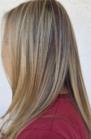 Dimensional blonde highlights on long straight hair