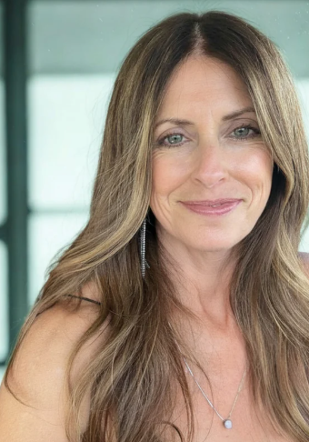 Soft brunette balayage with face-framing highlights